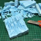 Ty�stin styrofoamista maaston muodot.